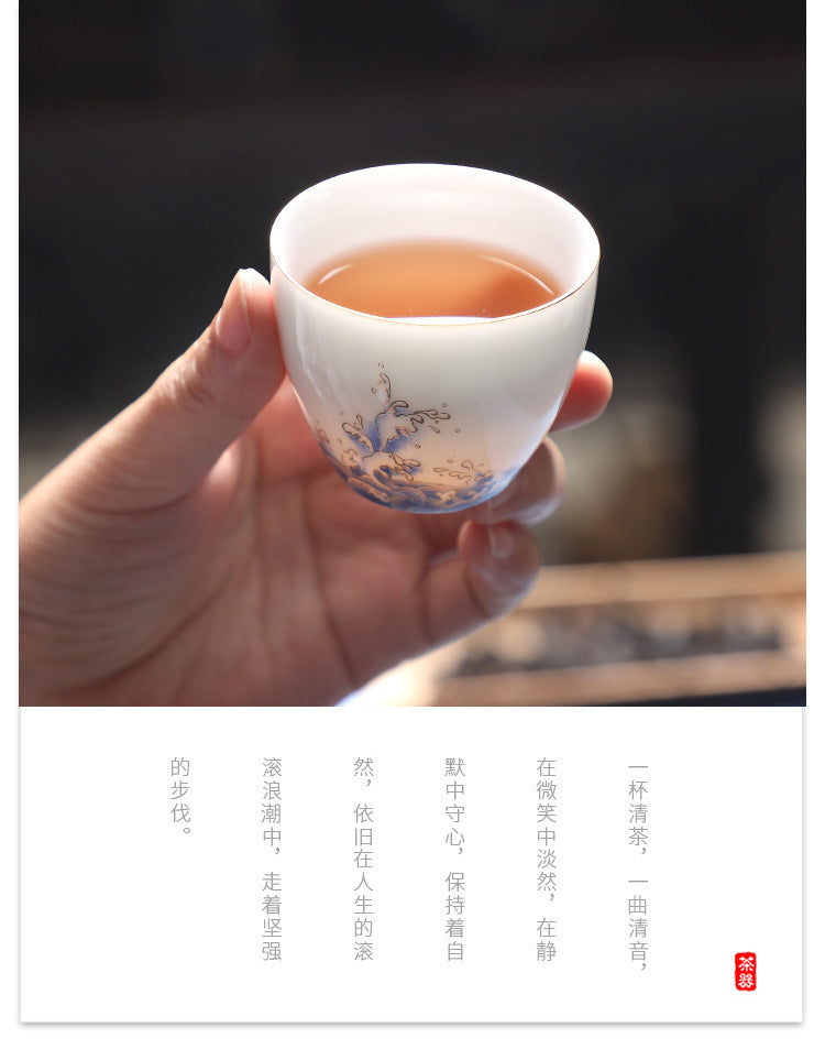Minimalist Hand-Painted Dehua Suet White Porcelain Tea Cup - Blue Lotus Motif
