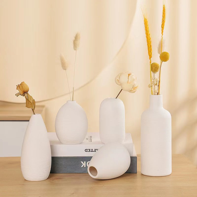 Blanc de Chine bud vase set styled in a modern interior - lifestyle view
