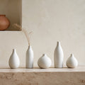 Blanc de Chine Bud Vase Set - five matte white bud vases main view
